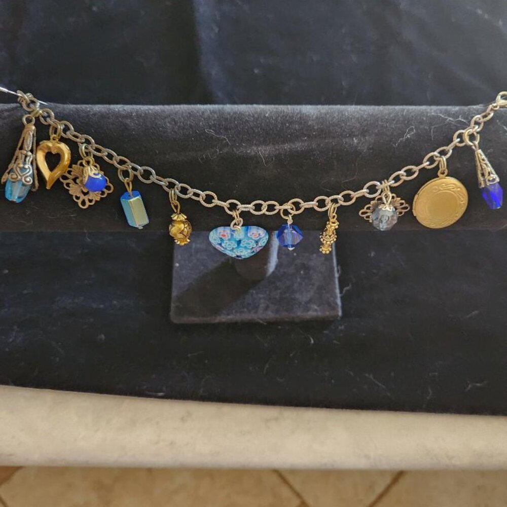 Vintage Charm bracelet, 8" with blue and gold-tone charms